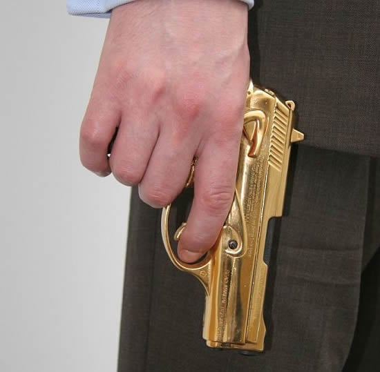 A gold plated Beretta pistol celebrates James Bonds Golden Jubilee A gold plated Beretta pistol celebrates James Bonds Golden Jubilee