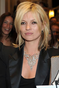 Kate Moss’s kiss auctioned for raising charity fund