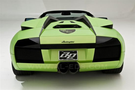 This Lamborghini Murcielago Roadster is customized with an automated cigar holder This Lamborghini Murcielago Roadster is customized with an automated cigar holder