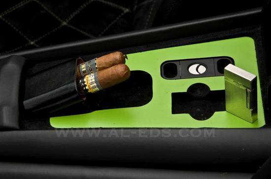 This Lamborghini Murcielago Roadster is customized with an automated cigar holder This Lamborghini Murcielago Roadster is customized with an automated cigar holder