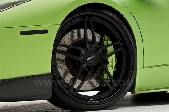 This Lamborghini Murcielago Roadster is customized with an automated cigar holder This Lamborghini Murcielago Roadster is customized with an automated cigar holder