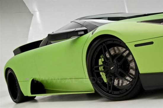 This Lamborghini Murcielago Roadster is customized with an automated cigar holder This Lamborghini Murcielago Roadster is customized with an automated cigar holder